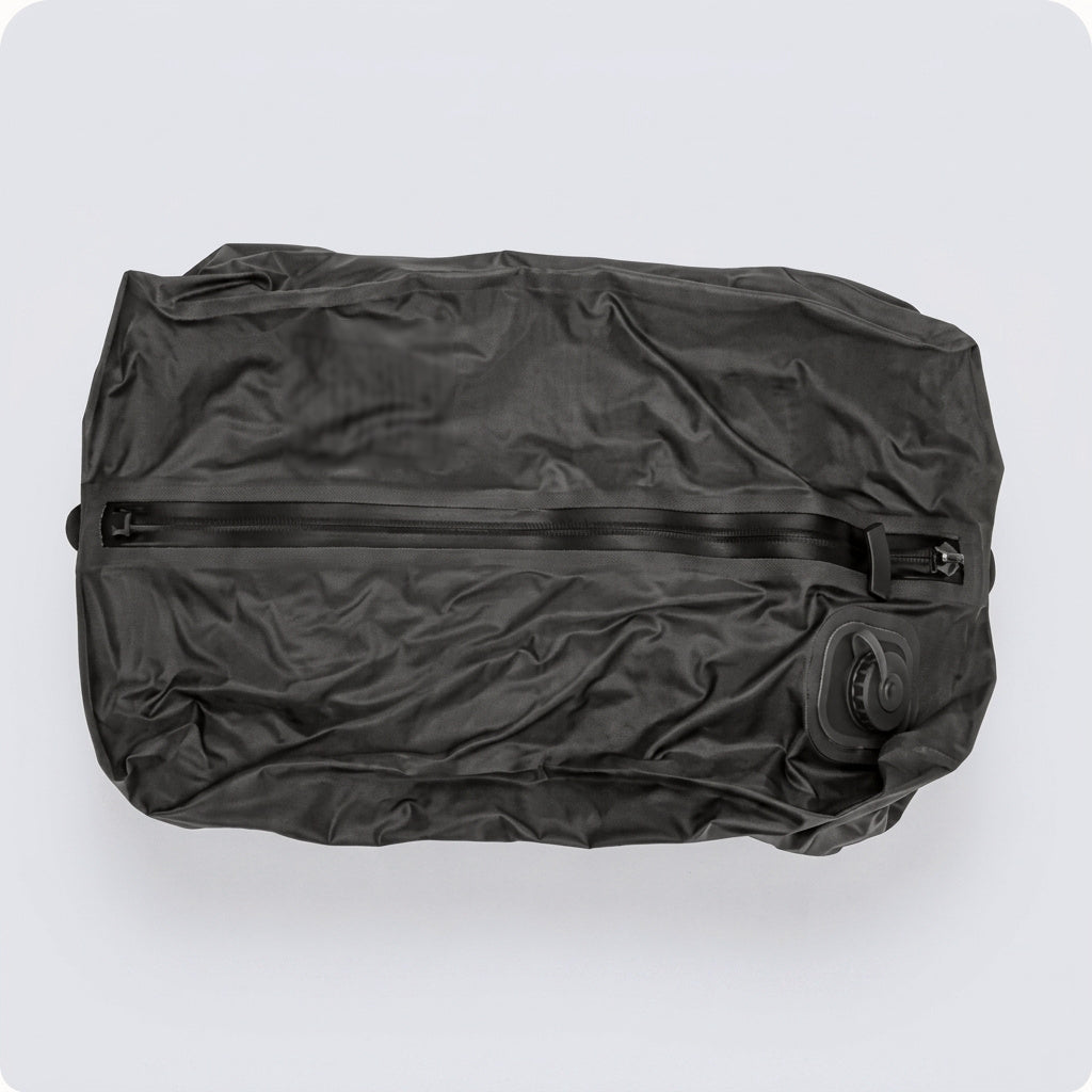 WayHome compression bag laid out flat and empty, showing the zipper and air valve